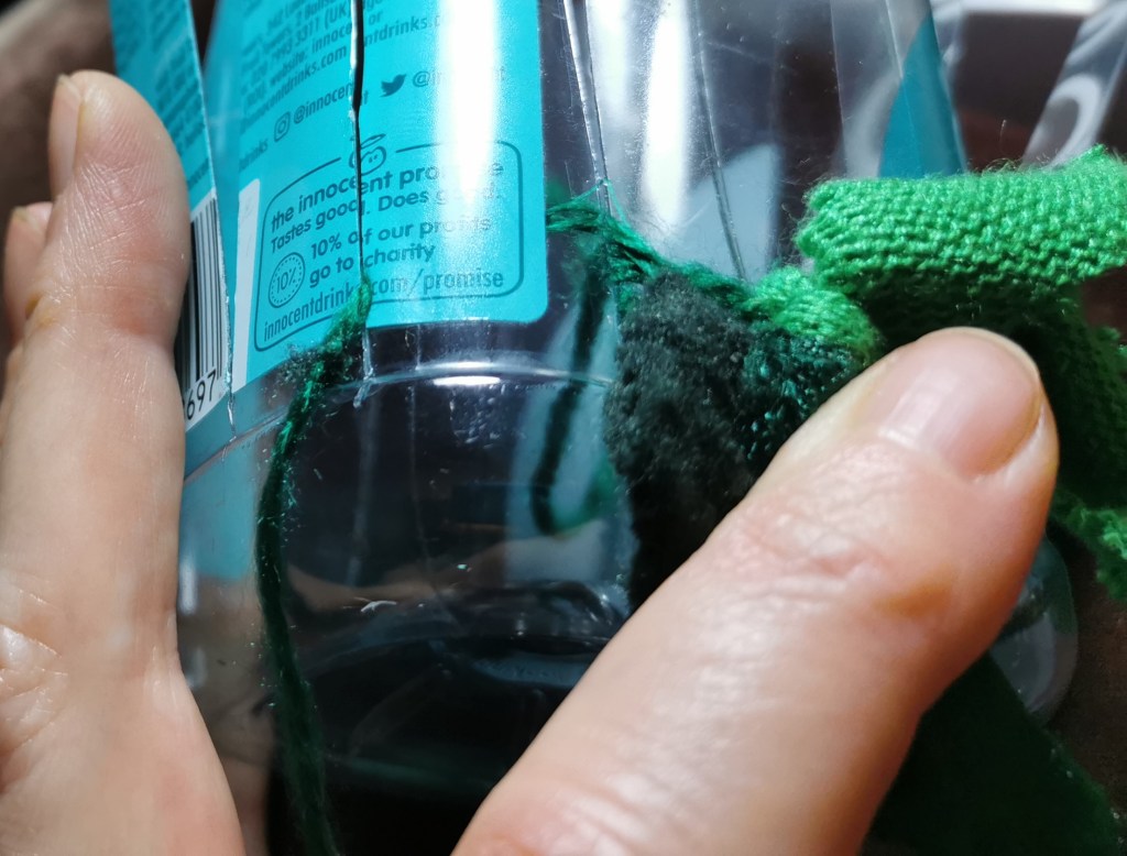 Yarn passed behind next strip, then in front of the next one.